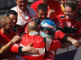 Алексей Дудукало обнимает партнера по команде Lukoil Racing Team Габриэле Тарквини. Фото WTCC