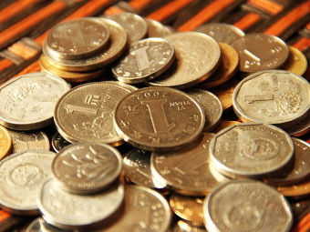 Монеты достоинством в 1 юань. Фото с сайта blog.chinadiscovery.com
