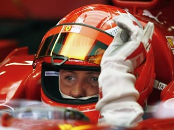 13 ноября. Михаэль Шумахер за рулем болида Ferrari. Фото <a href="http://lenta.ru/info/afp.htm" target="_blank">AFP</a>