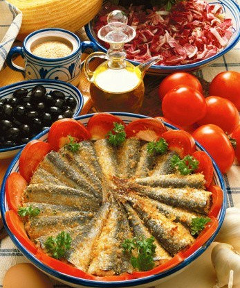 Сардины, запеченные с белым вином и панировочными сухарями
